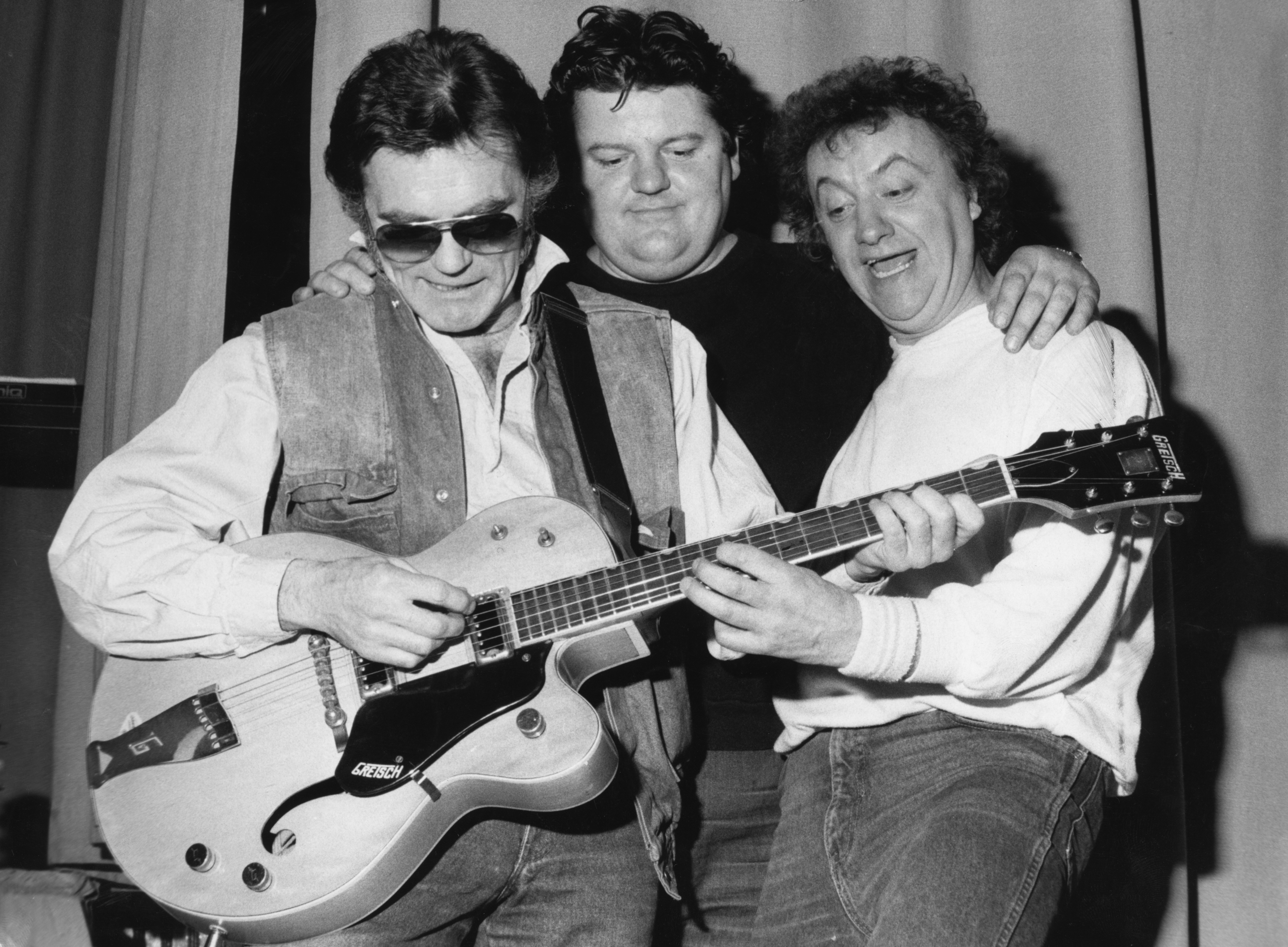 Money, right, with Robbie Coltrane and Maurice Roeves, left, promoting Tutti Frutti in 1986