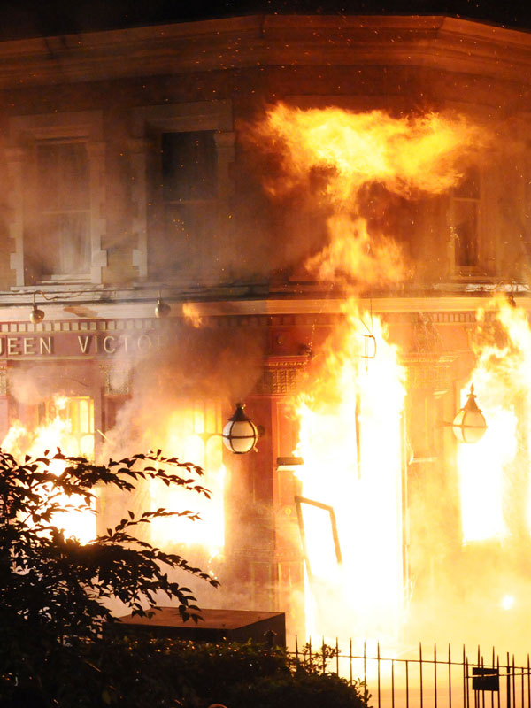 Phil Mitchell set fire to the Queen Vic pub 14 years ago